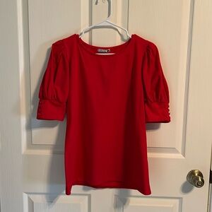 Bright red, knit, short sleeved top, size large. Perfect for the holidays!